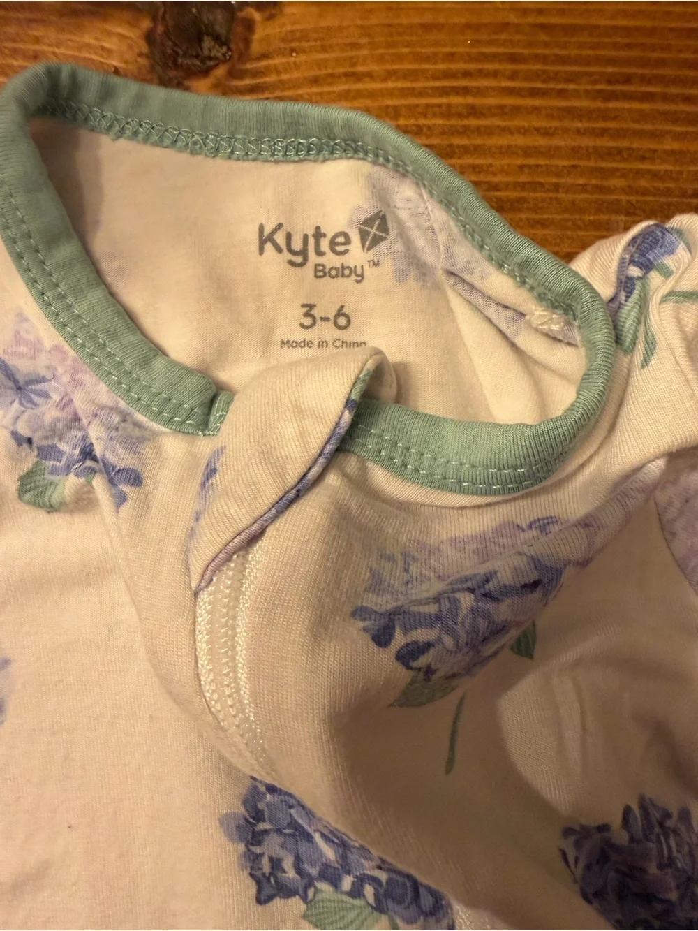 Kyte BABY Cream Footed One-Piece with Blue Hydrangea Print